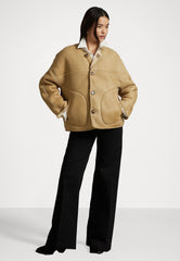 Cream fuzzy short jacket with large pockets