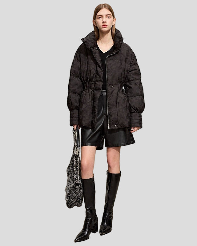 Quilted jacket with structure, high collar and drawstring at the waist