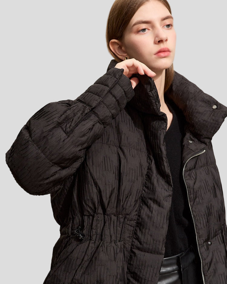 Quilted jacket with structure, high collar and drawstring at the waist