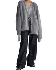 Oversized cardigan with buttons and long sleeves