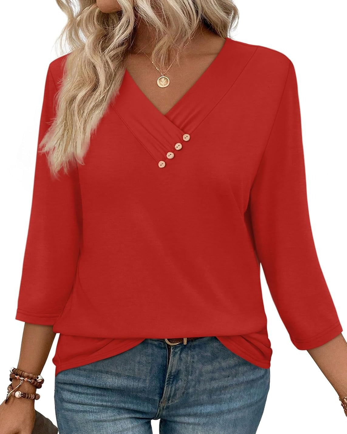 V-neck top with gathered front and decorative buttons