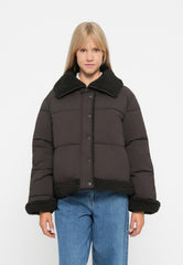 Dark brown short puffer jacket with black teddy collar and hem