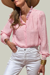 Pink shirt with lace trim and gathered sleeves