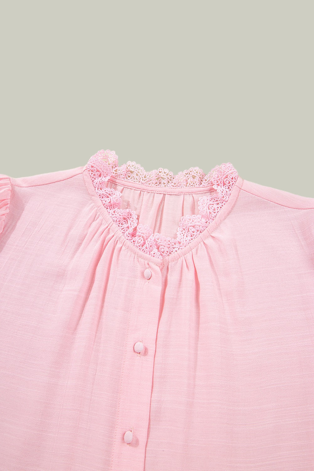 Pink shirt with lace trim and gathered sleeves