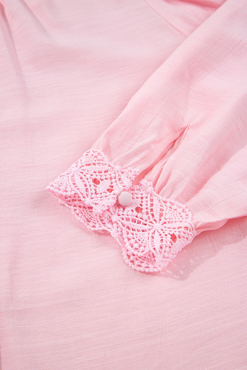 Pink shirt with lace trim and gathered sleeves