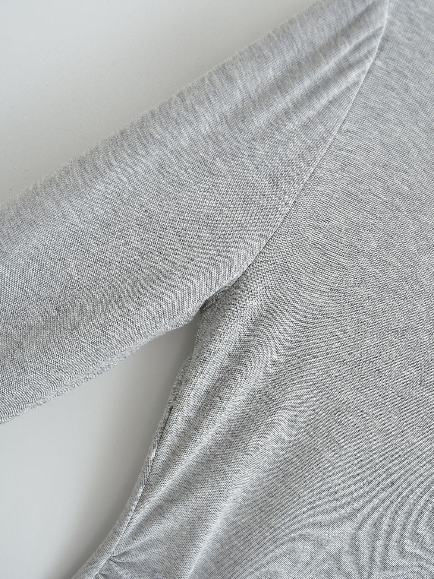 Asymmetrical off-shoulder long-sleeved top with ruched detail