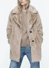 Teddy coat with lapels and a loose fit