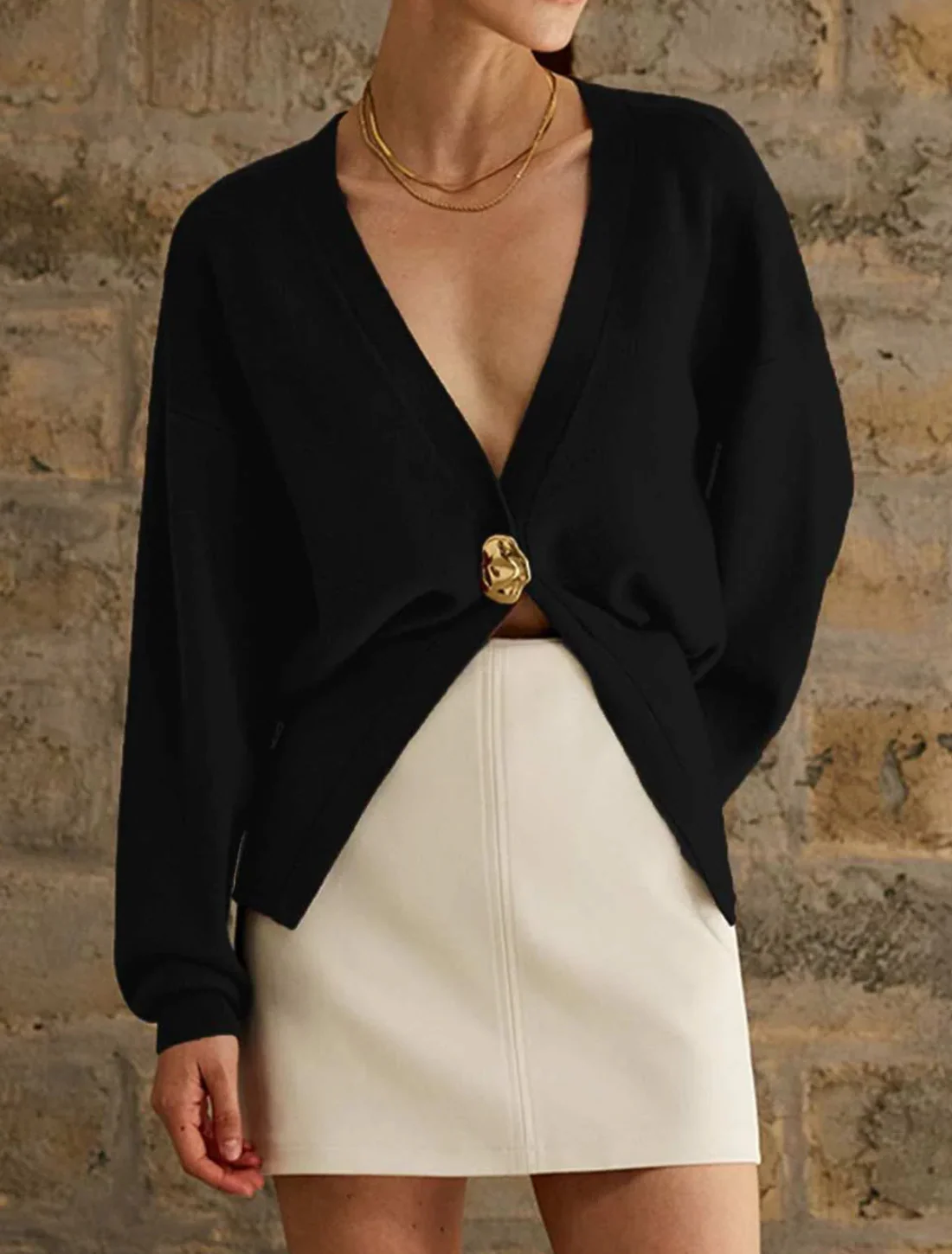 Cardigan with sculpted button and v-neck