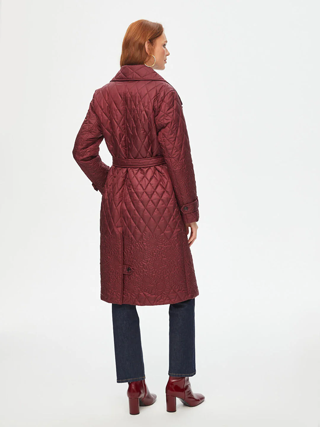 Quilted long coat with floral details