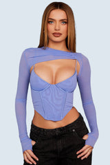 Blå korsett med asymmetriskt snitt