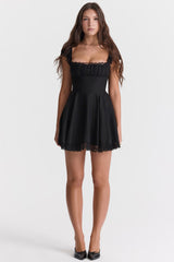 Black mini dress with lace trim