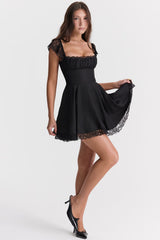 Black mini dress with lace trim