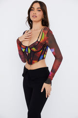 Korsett med lå nga ärmar och tryck