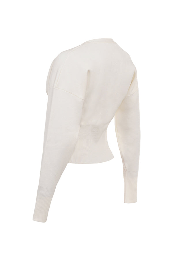 Vit stickad cardigan med V-hals och byxor