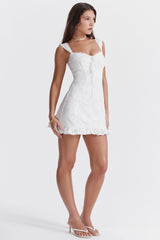 Vit broderad mini-klänning