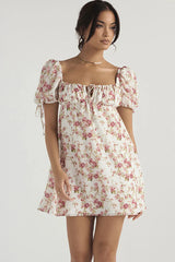 White babydoll dress with pink flowers