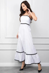 Long white dress with black trim