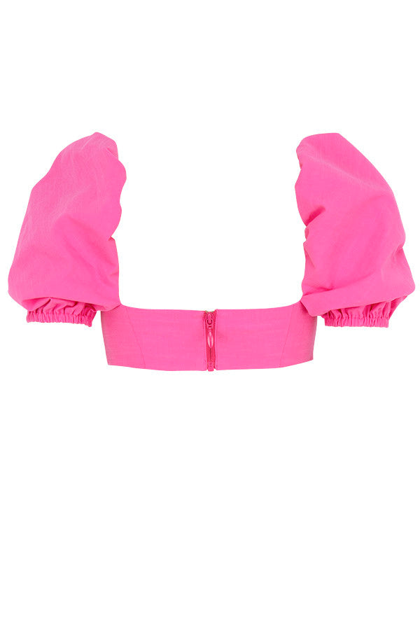 Korsettöverdel i rosa linne med puffärmar och minikjol