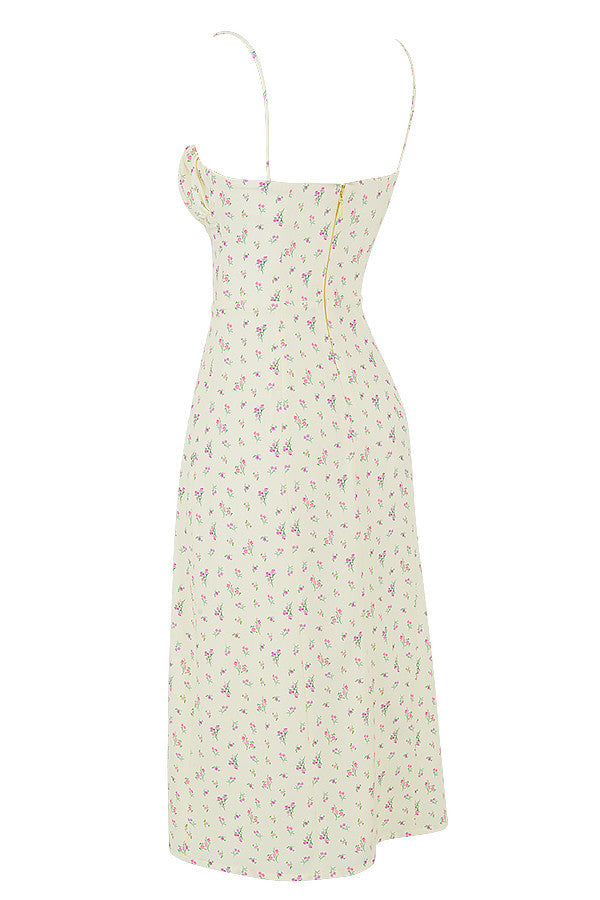 Blommig klänning med bustier och utskuret ben