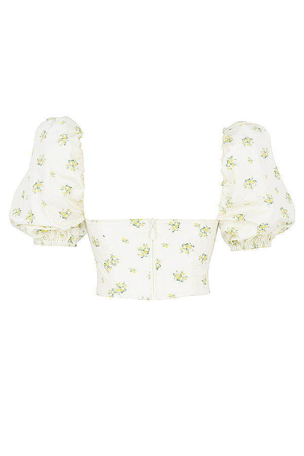 Elfenbensfärgad korsett med blommor och puffärmar
