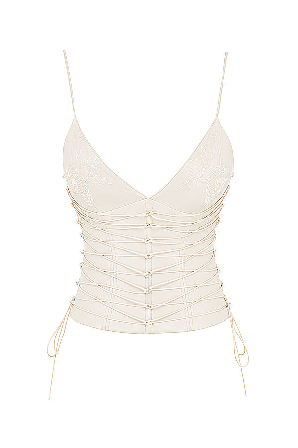 Kräm vegansk läderkorsett med draperad midikjol