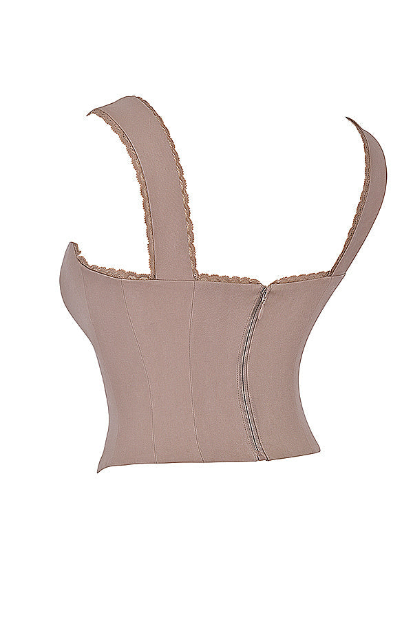 Korsett med spets framtill och kjol med utskuret ben