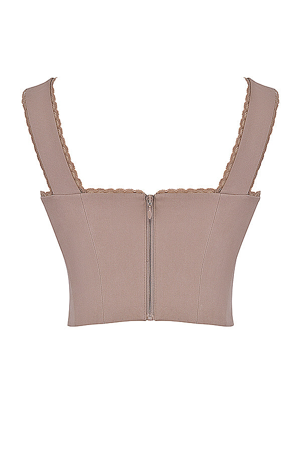 Korsett med spets framtill och kjol med utskuret ben