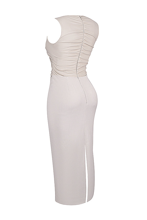 Cream-colored sleeveless wrap maxi dress with v-neck