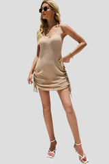 Beige backless mini dress with side knots