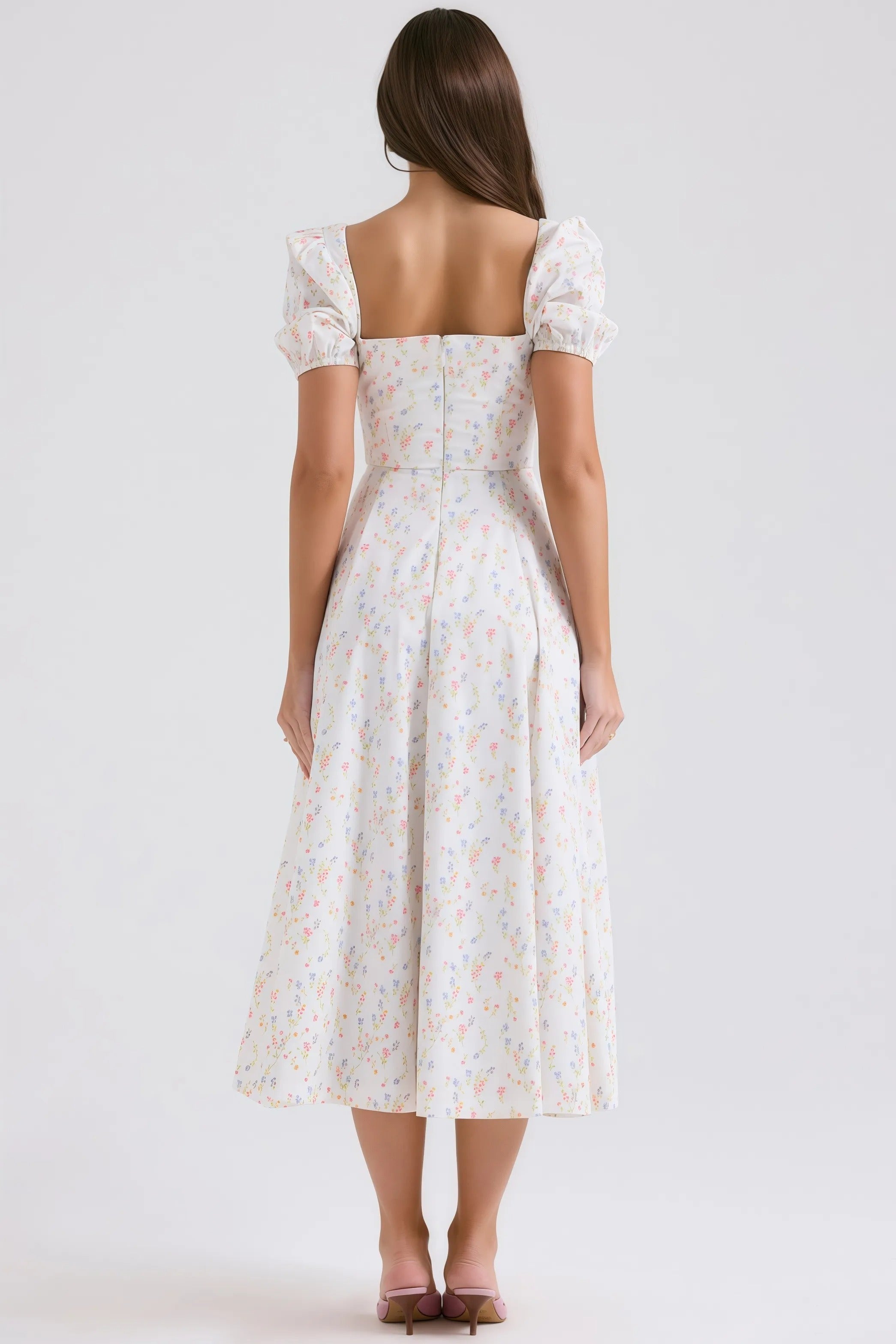 White midi dress with pastel floral pattern and puff sleeves