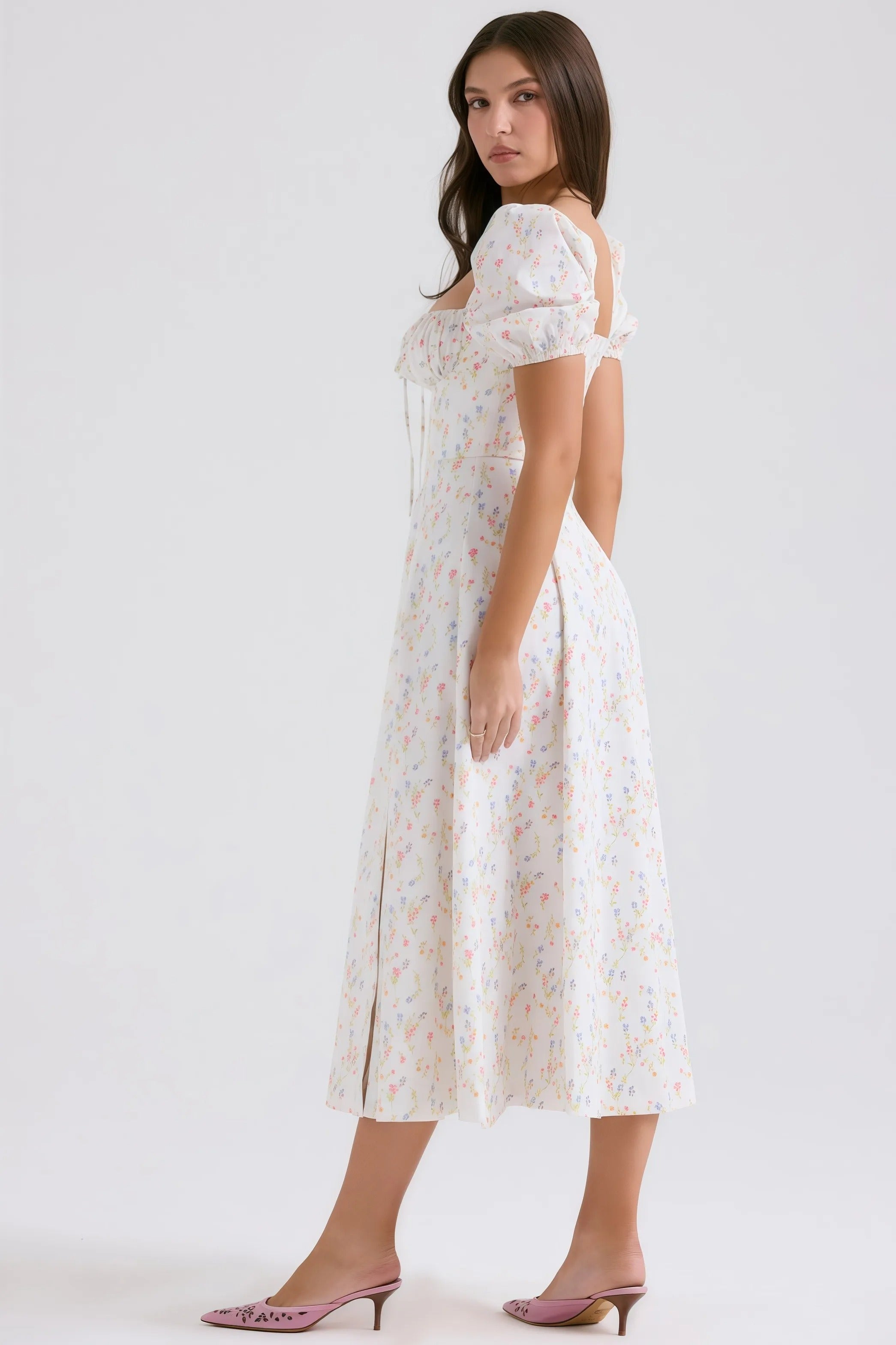 White midi dress with pastel floral pattern and puff sleeves