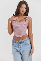 Avslappnad korsett med rosa tryck